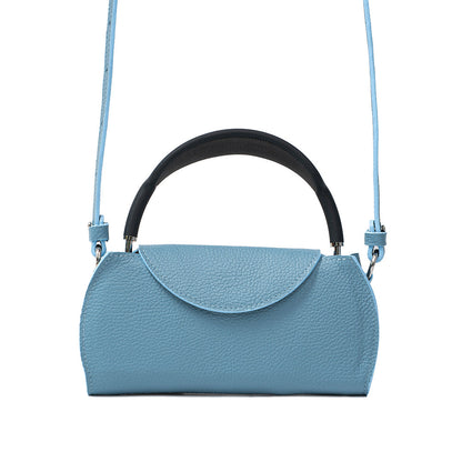 Sky blue leather AirPods Max case with long adjustable shoulder strap, minimalist rounded flap design