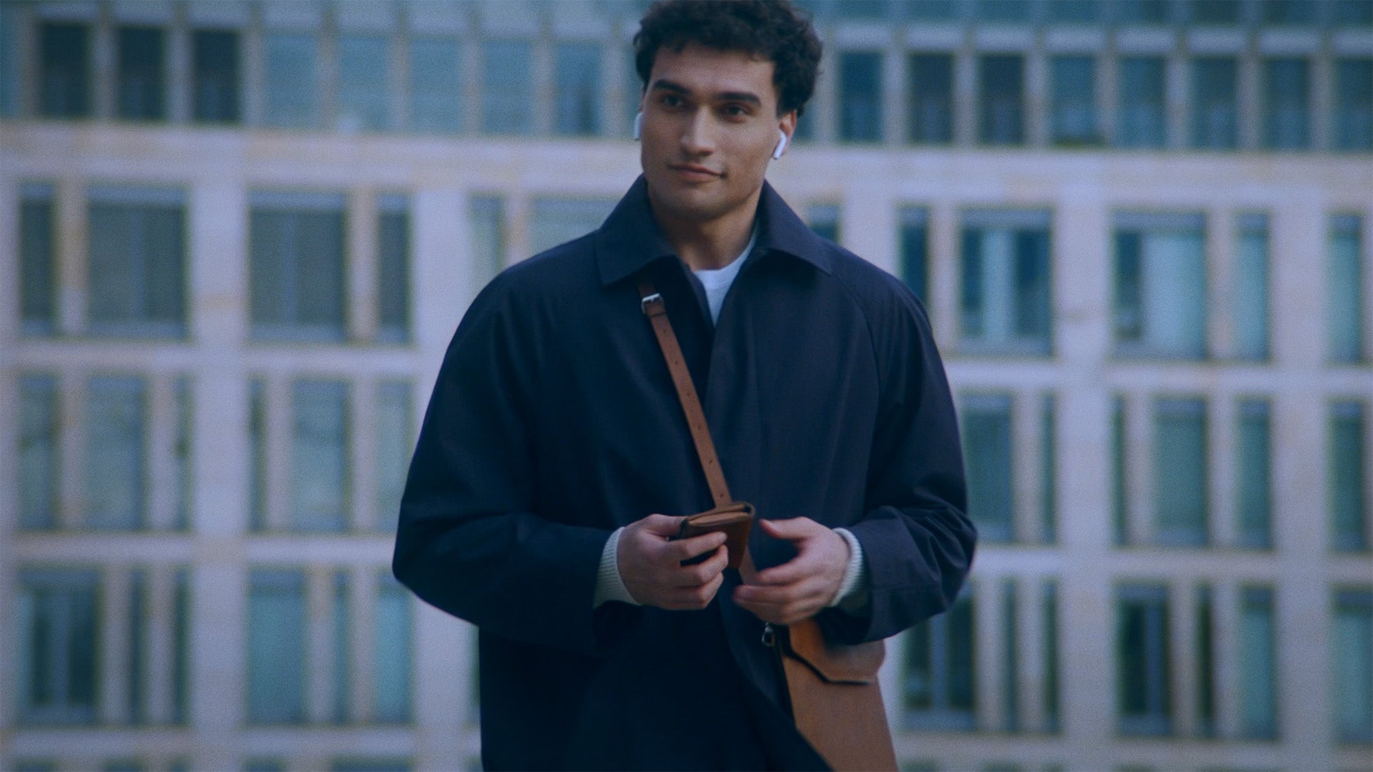 Leather AirTag wallet shown in everyday urban setting