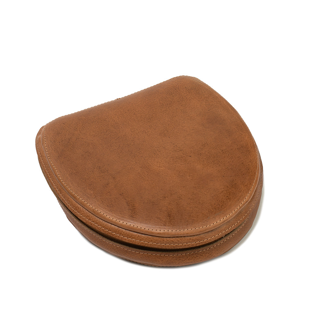 Full-grain Italian leather case for AirPods Max in brown — closed view with reinforced panels; soft lining inside and magnets for Low Power Mode