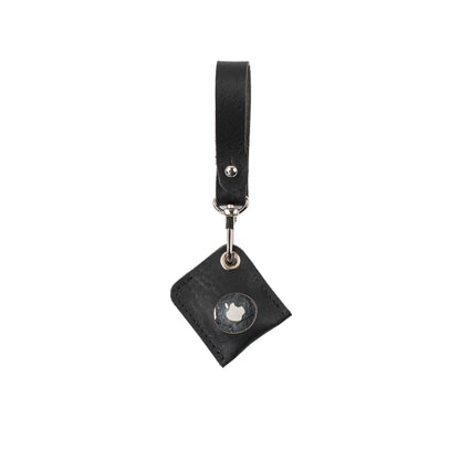Black leather AirTag bag charm with a loop strap, silver-tone clasp and circular opening for the AirTag.