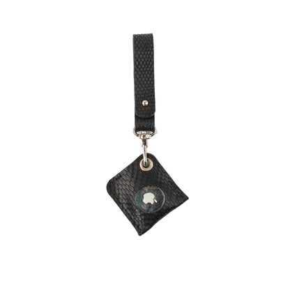 Black snake-print leather AirTag bag charm with a matching loop strap, showing the metal AirTag face.
