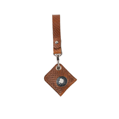 Brown snake-print leather AirTag bag charm with a matching loop strap, showing the metal AirTag face.