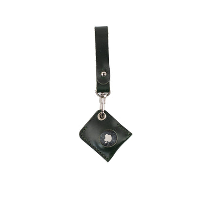 Dark brown leather AirTag bag charm with a loop strap and stitched square holder, showing the metal AirTag face.