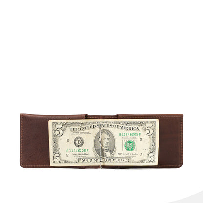 Leather AirTag money clip wallet holding U.S. dollar bills, slim cash-carry design