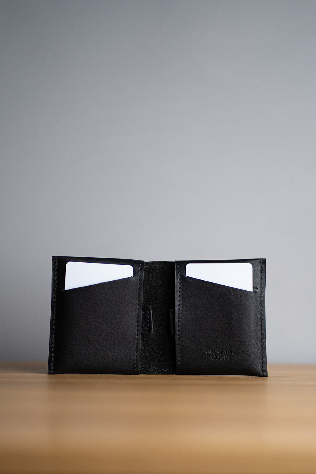 Leather Billfold 3.0 airtag wallet holding cards.