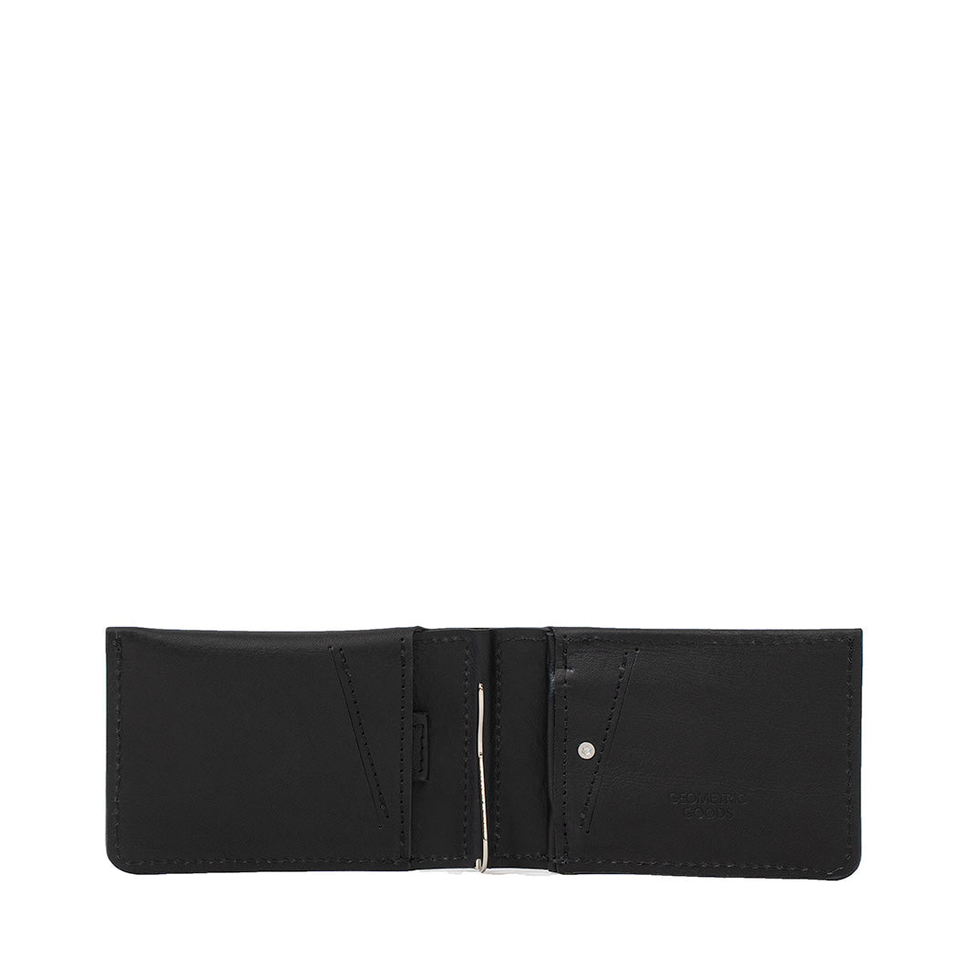 Slim black leather AirTag wallet opened flat, minimalist bifold layout with money clip