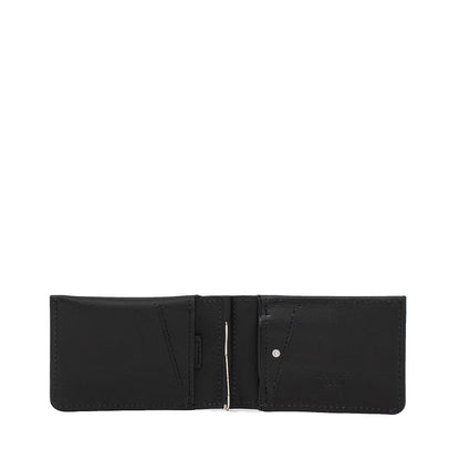 Slim black leather AirTag wallet opened flat, minimalist bifold layout with money clip