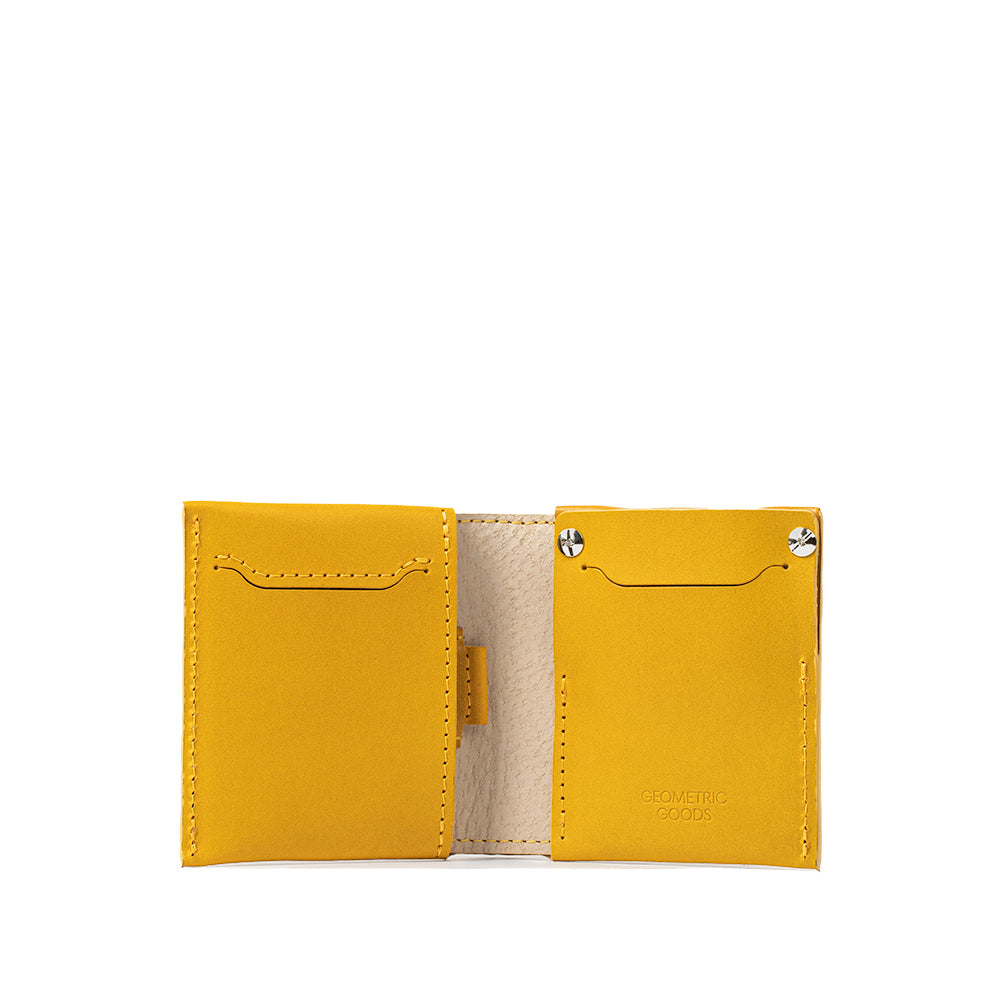 Yellow leather AirTag wallet combining vibrant color and functionality
