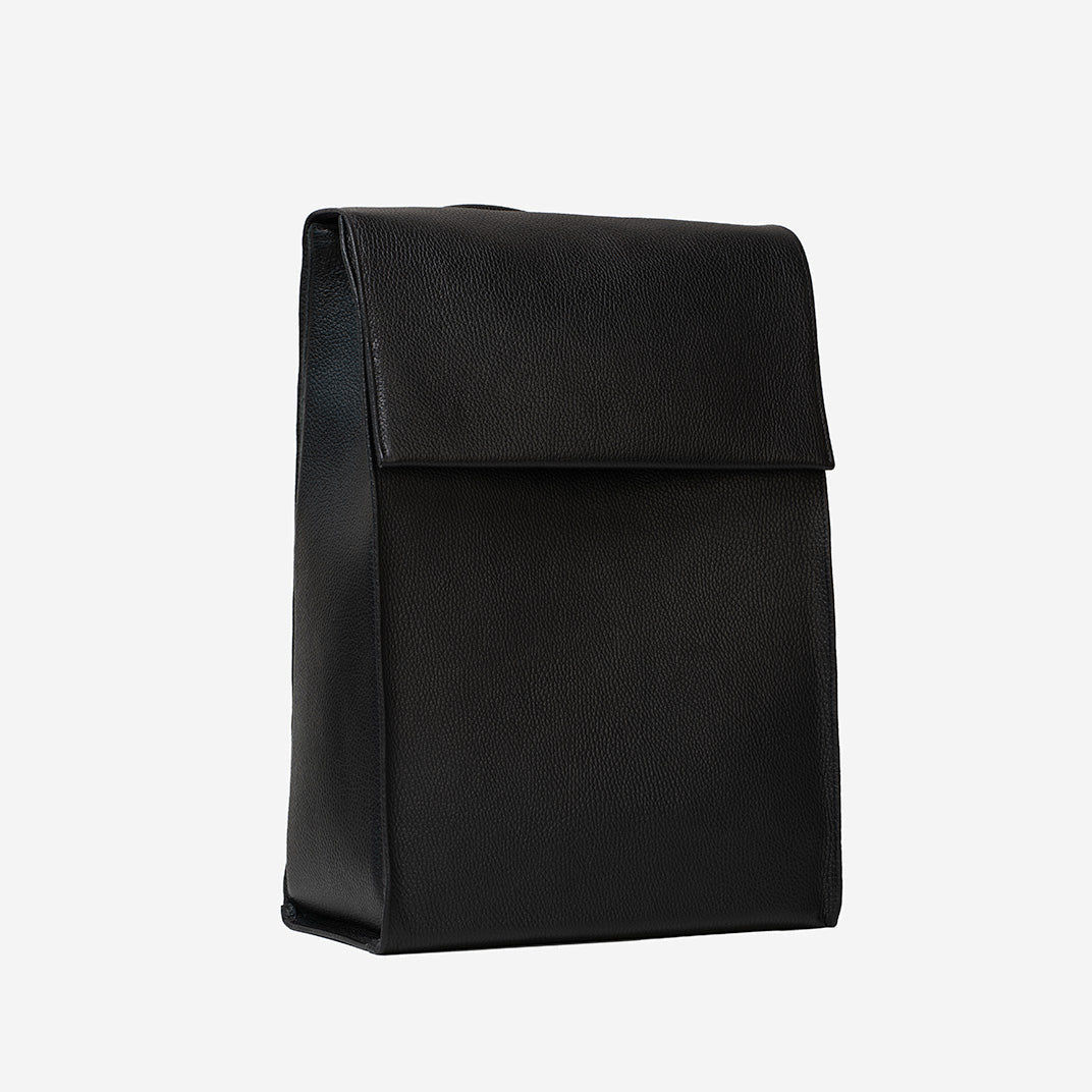 Front view of big leather backpack with minimalist design handcrafted from premium Italian leather