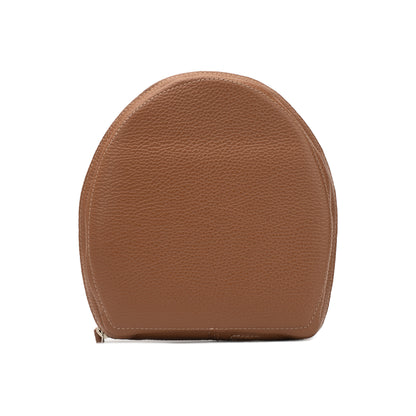 Brown leather case for AirPods Max with structured front profile and stitched finish