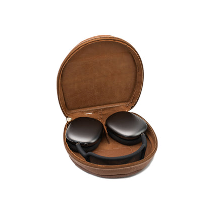 Brown leather AirPods Max case opened with soft interior lining and headphones inside