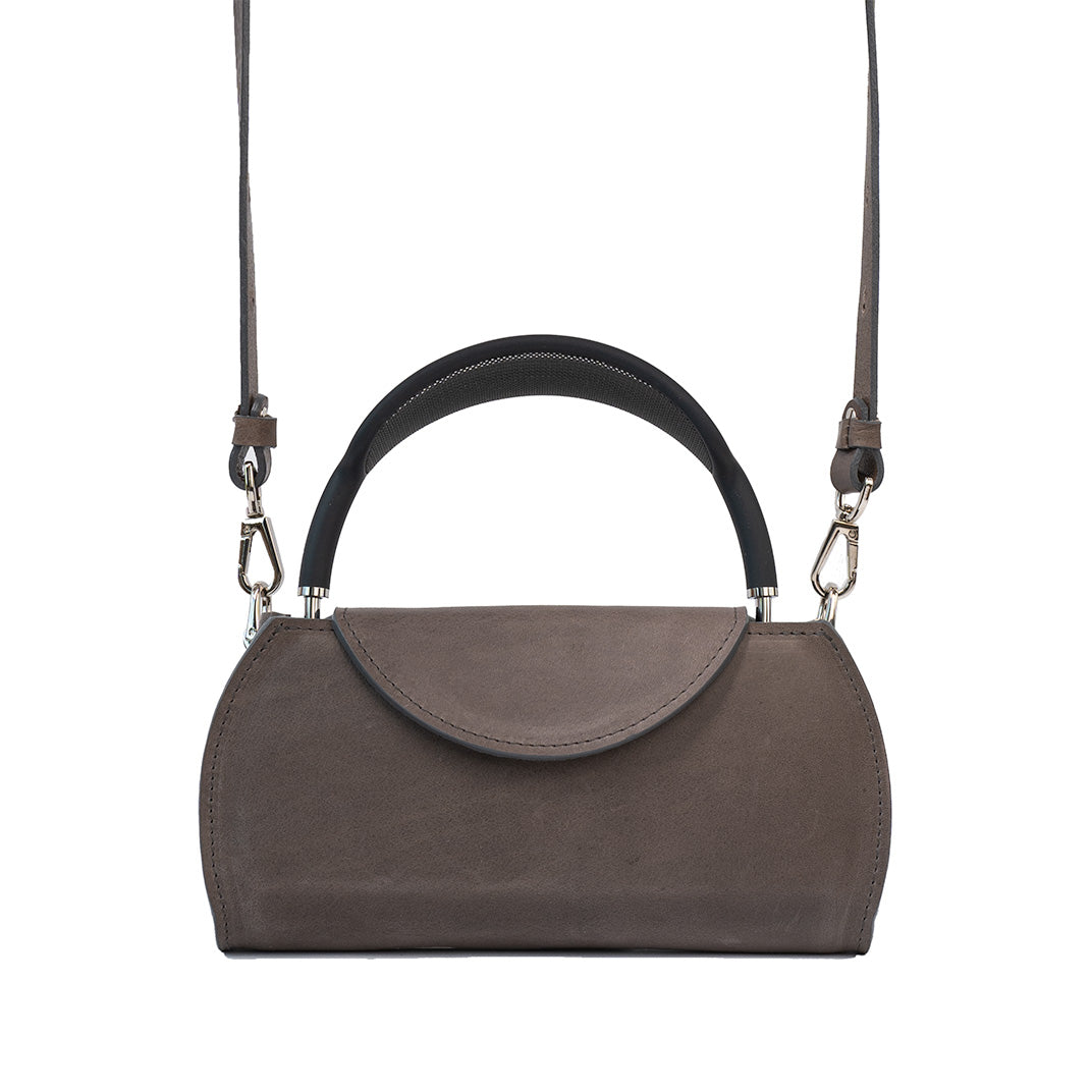 AirPods Max Case in gray leather, designed with a comfortable handle and an adjustable crossbody strap for versatile carrying of Apple's headphones