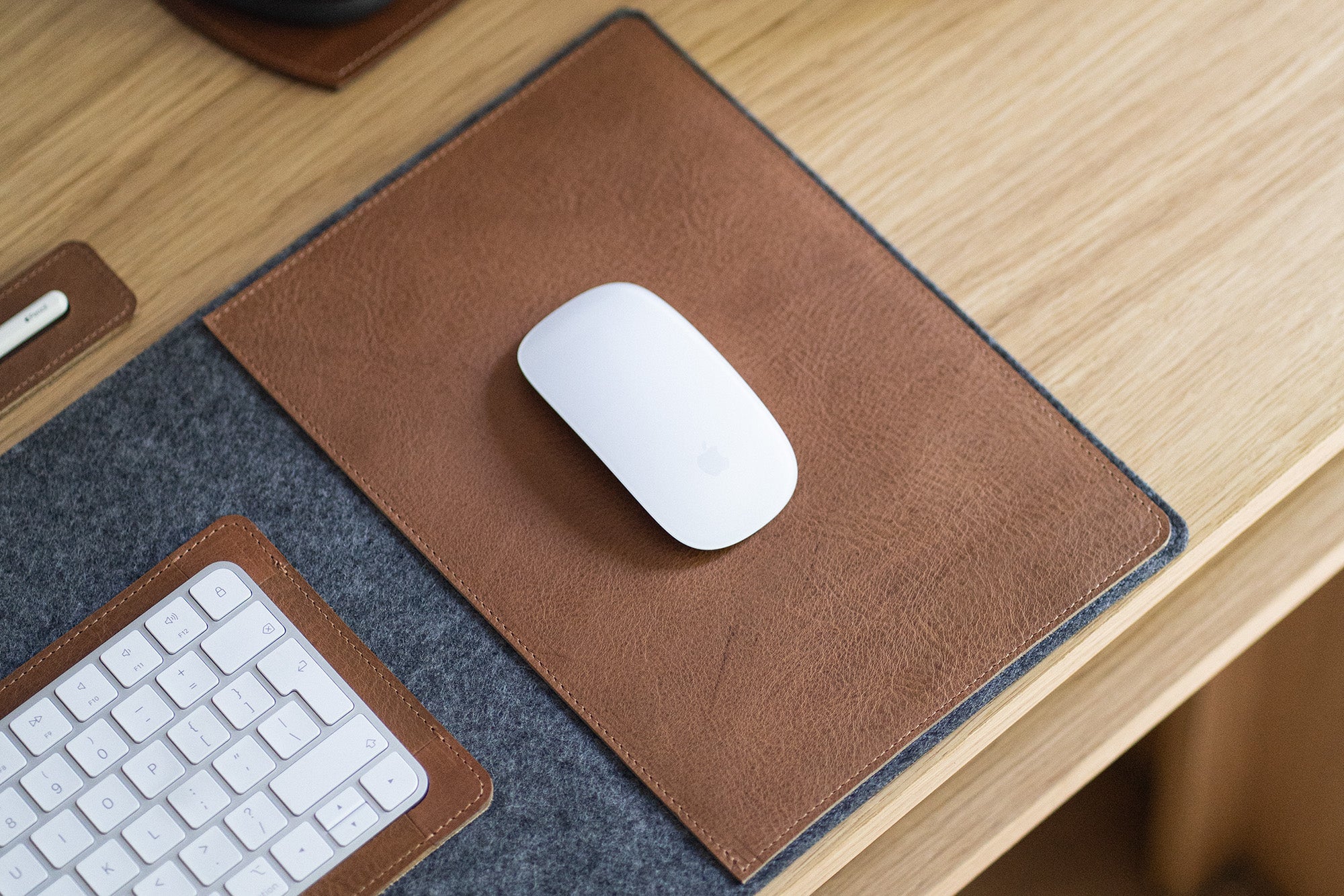 Leather mouse insert on wool felt desk pad