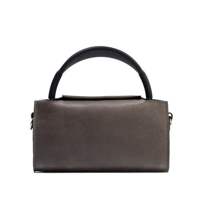 Elegant gray handbag, perfect for AirPods Max, with secure magnetic closures.