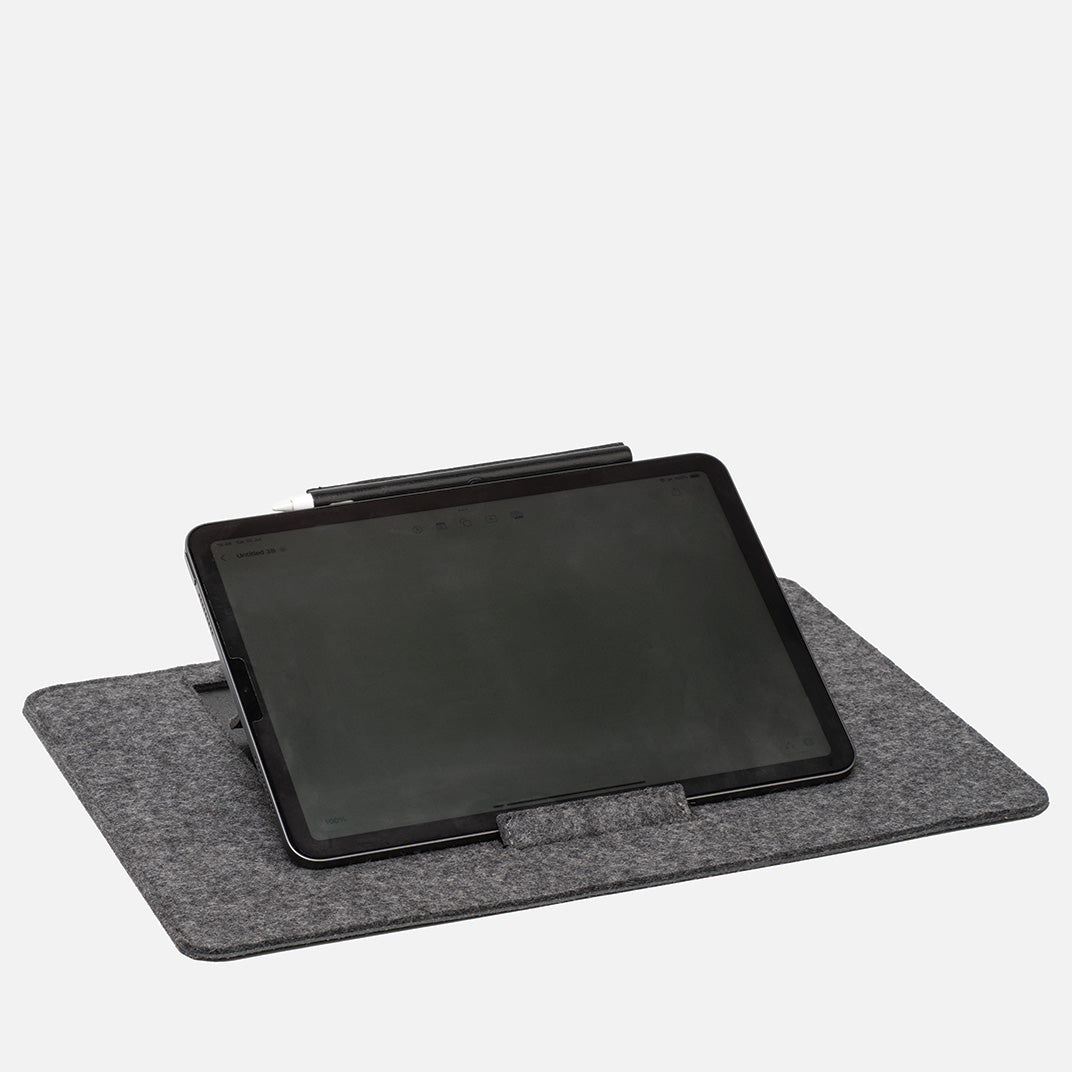 iPad positioned horizontally on grey wool felt stand, ideal for video calls, reading, or landscape productivity use