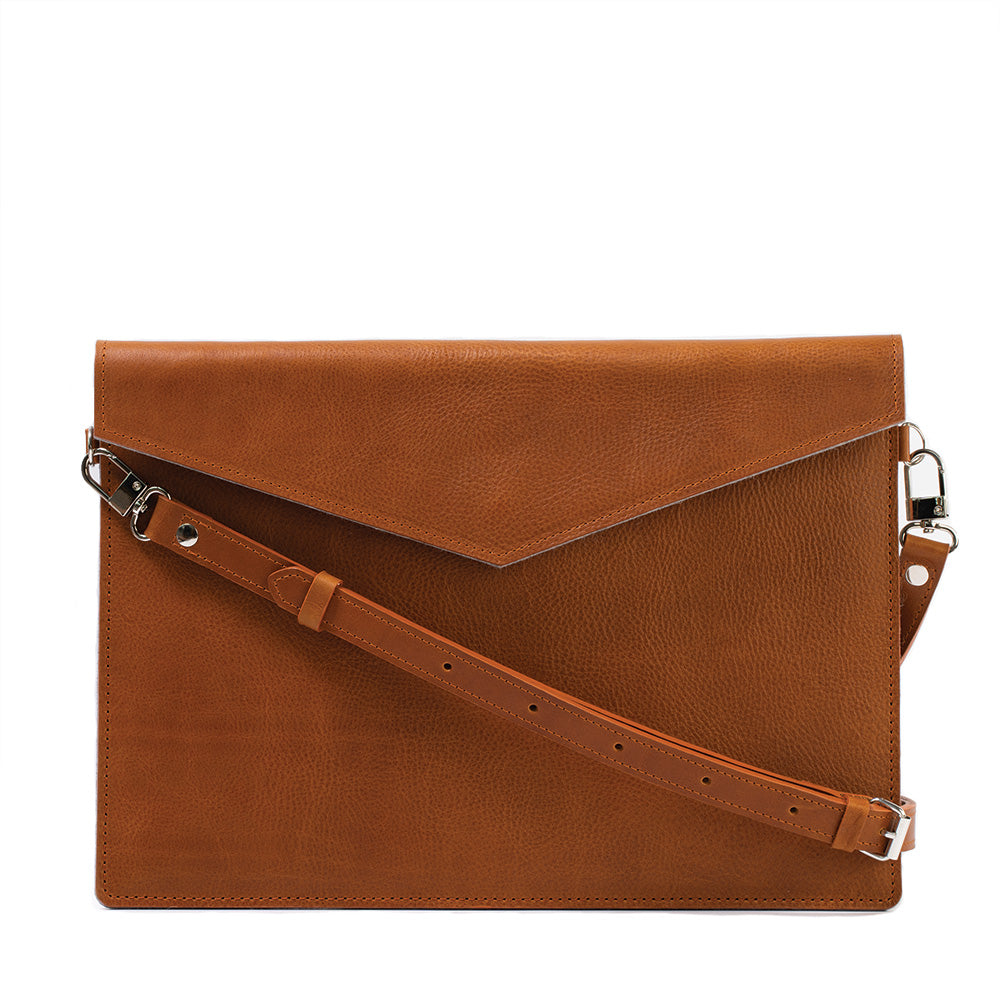 premium quality tan cognac brown color Leather Sleeve with adjustable strap for iPad made by Geometric Goods from premium quality Italian leather for woman and men