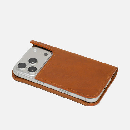 iPhone 17 Pro in tan full-grain leather folio wallet case, slim front view