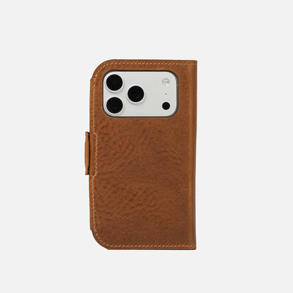 iPhone Air Classic 5.1 leather folio in brown — closed back view with precise camera cutout and low-profile magnetic strap; full-grain Italian leather, MagSafe-ready