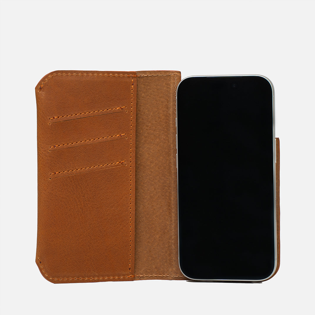 Open tan leather MagSafe folio wallet for iPhone 17 with three card slots and suede lining – Geometric Goods