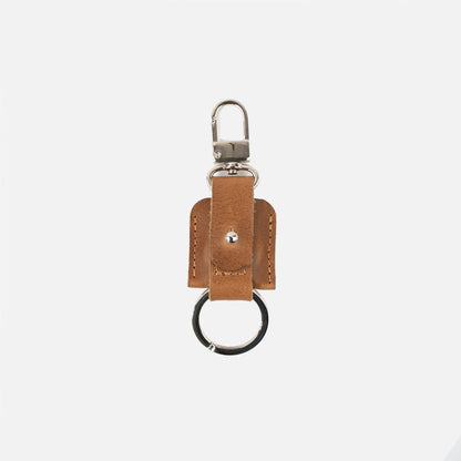 Leather AirTag keychain snap hook detail