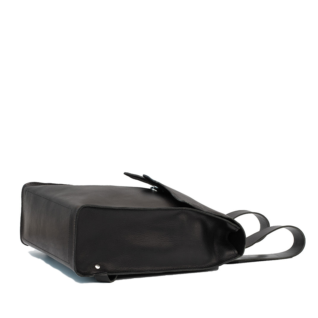 Bottom view of the Fibonacci leather backpack showing the sturdy construction and sleek design