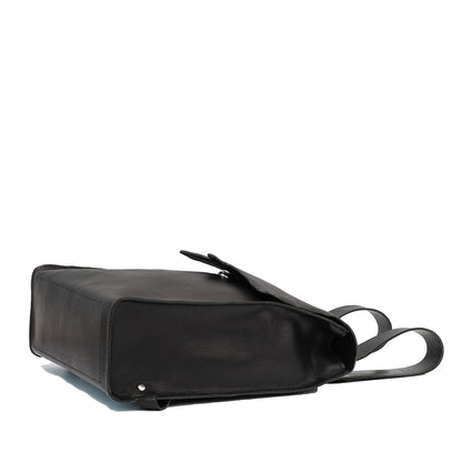 Bottom view of the Fibonacci leather backpack showing the sturdy construction and sleek design