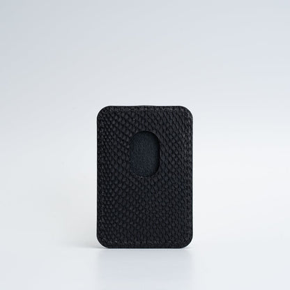 Backside of black leather MagSafe wallet for iPhone with embossed snake print, vegetable-tanned leather