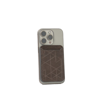 Gray leather MagSafe wallet for iPhone with handcarved Vectors geometric design, vegetable-tanned Italian leather, handcrafted, shown on iPhone