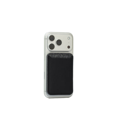 MagSafe leather wallet — Merino edition in black with grey wool felt top on iPhone; Italian full-grain leather, 2–3 card capacity, Apple-approved magnet