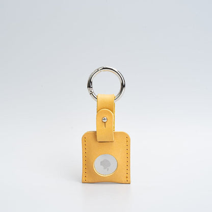 mustard yellow leather airtag keyring with carabiner