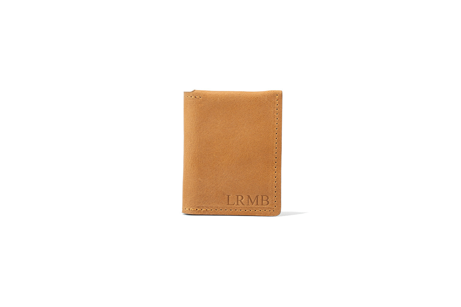 Personalized leather AirTag card wallet with initials debossed on the front, shown closed on a white background
