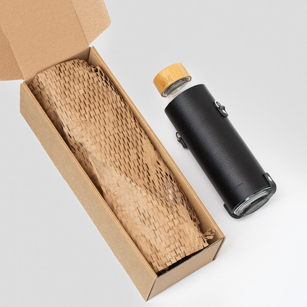 sustainable leather water bottle bag and glass bottle