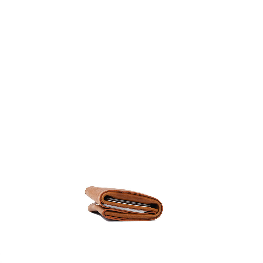 Tan AirTag wallet trifold for men demonstrating a refined and functional design