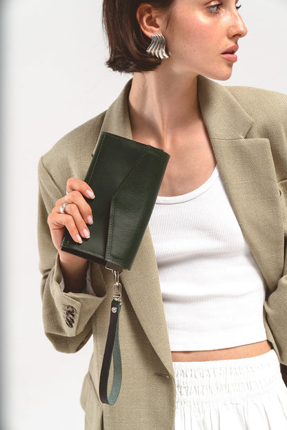 Women's AirTag wallet in dark green leather, featuring ten card slots, three compartments, and a hidden AirTag slot for enhanced functionality and elegance